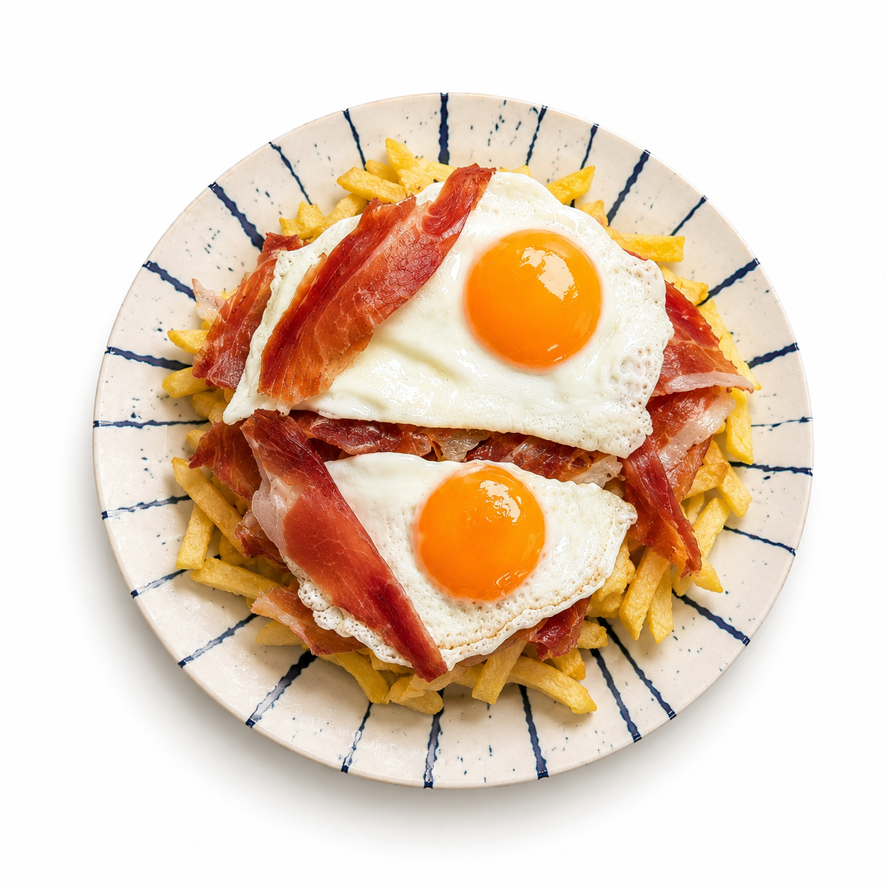 Huevos rotos con jamón salado
